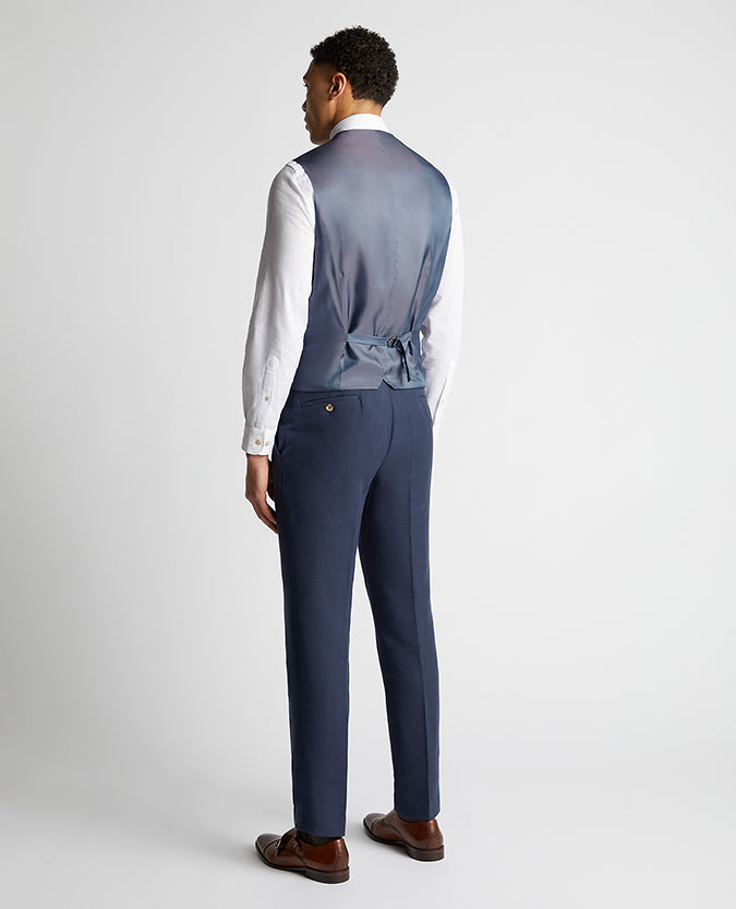 Man wearing a blue Tapered Fit Linen-Blend Waistcoat