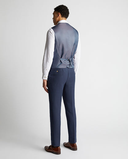 Man wearing a blue Tapered Fit Linen-Blend Waistcoat