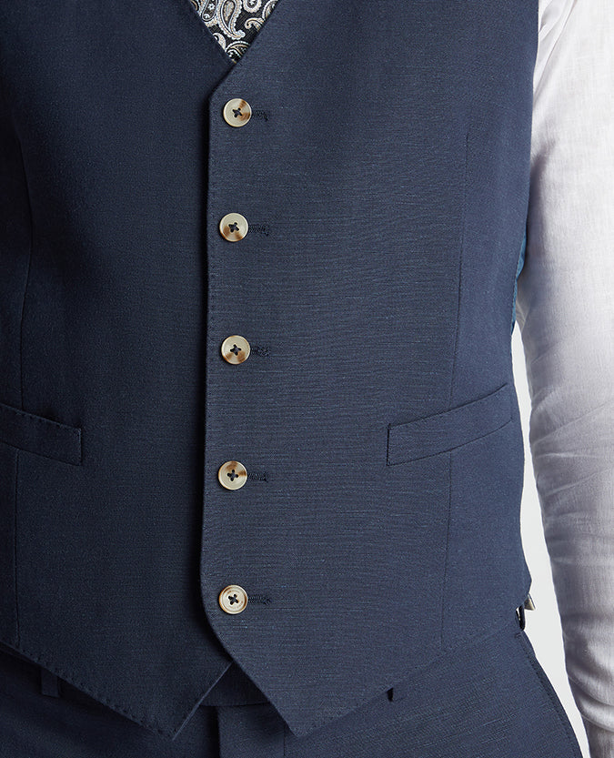 Man wearing a blue Tapered Fit Linen-Blend Waistcoat