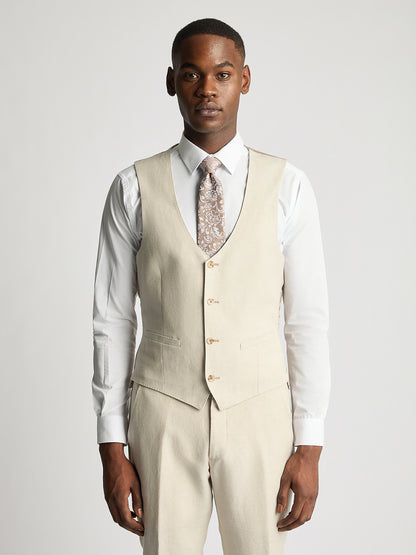 Man wearing a cream suit