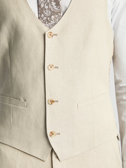 Man wearing a cream suit