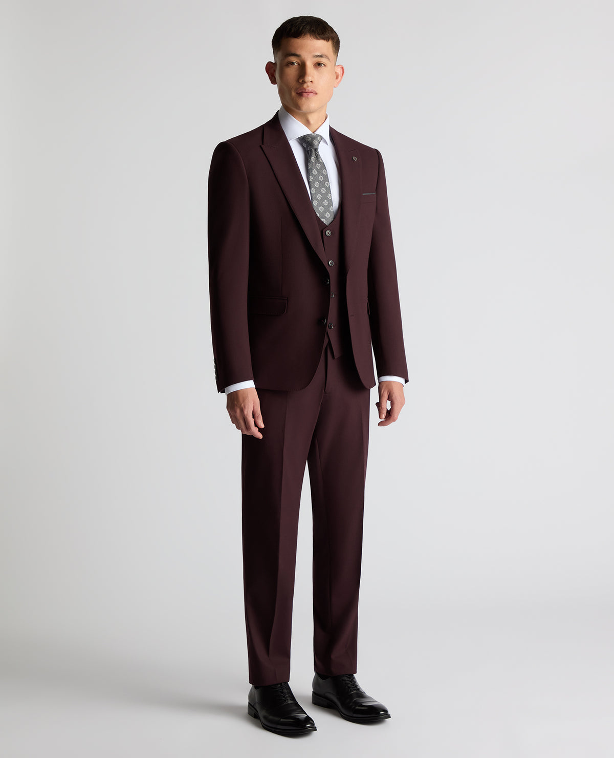Man wearing a red Slim Fit Stretch Suit Jacket