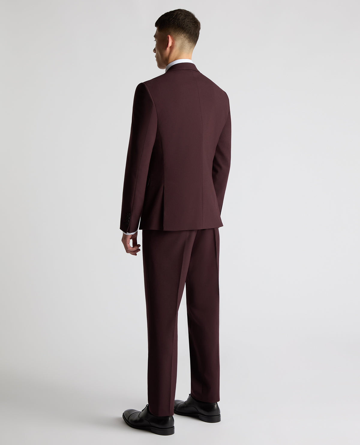 Man wearing a red Slim Fit Stretch Suit Jacket
