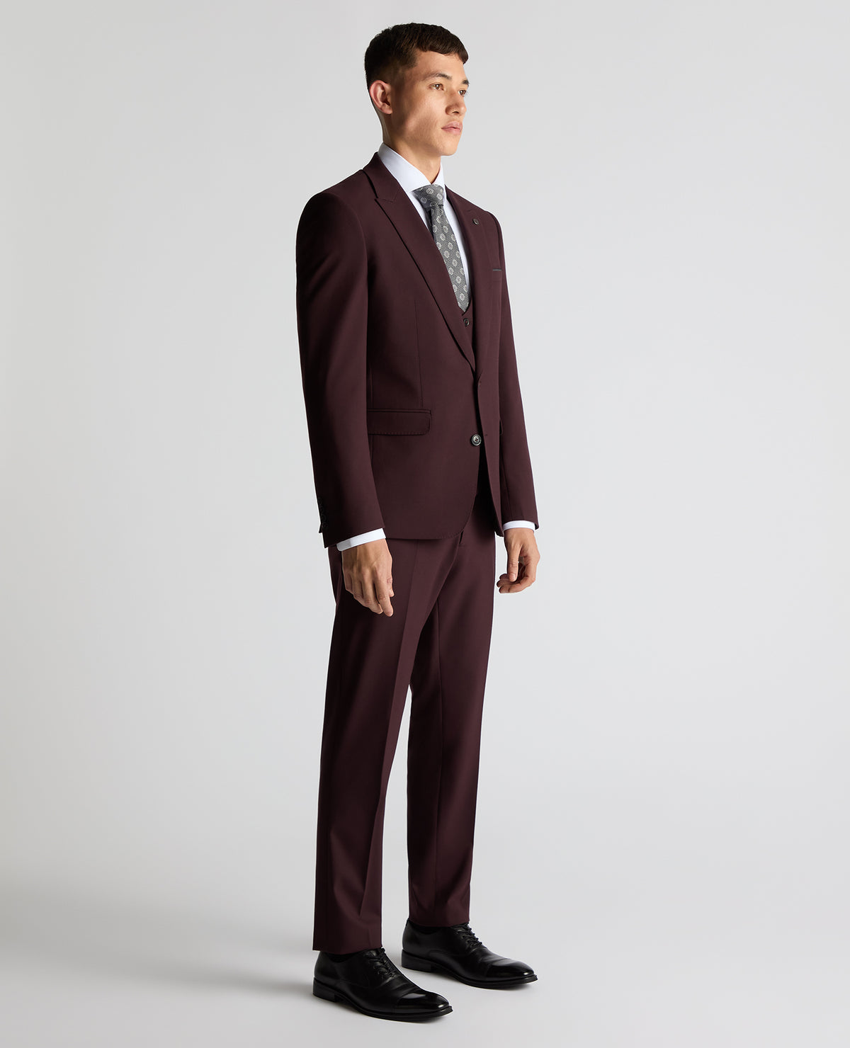 Man wearing a red Slim Fit Stretch Suit Jacket