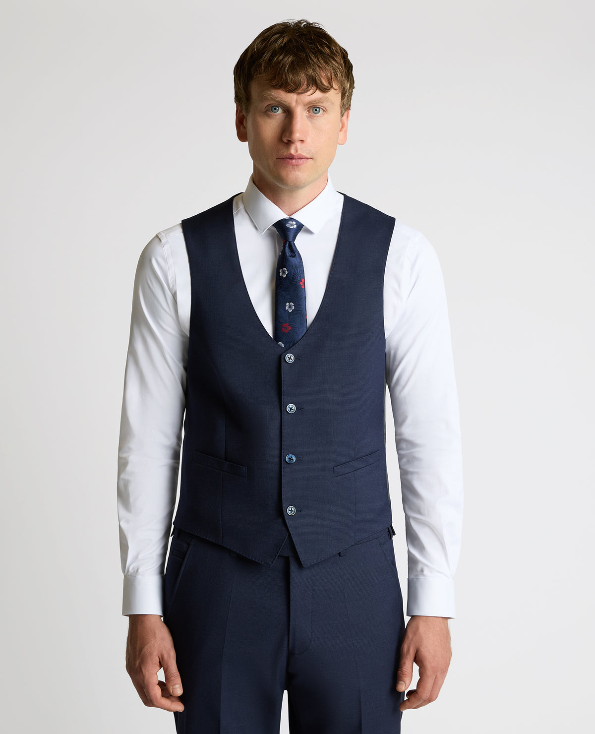 Man wearing a navy suit