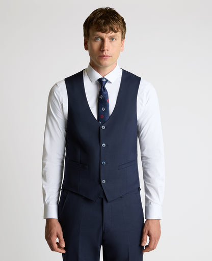 Man wearing a navy suit