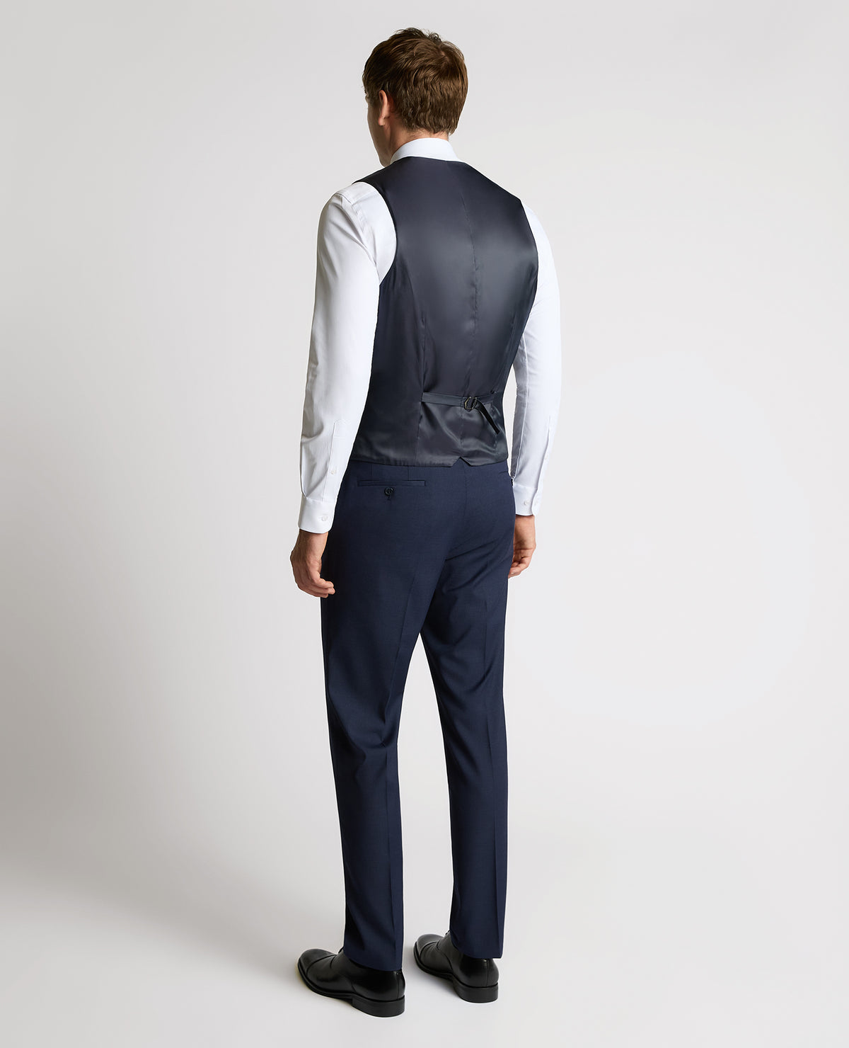 Man wearing a navy suit
