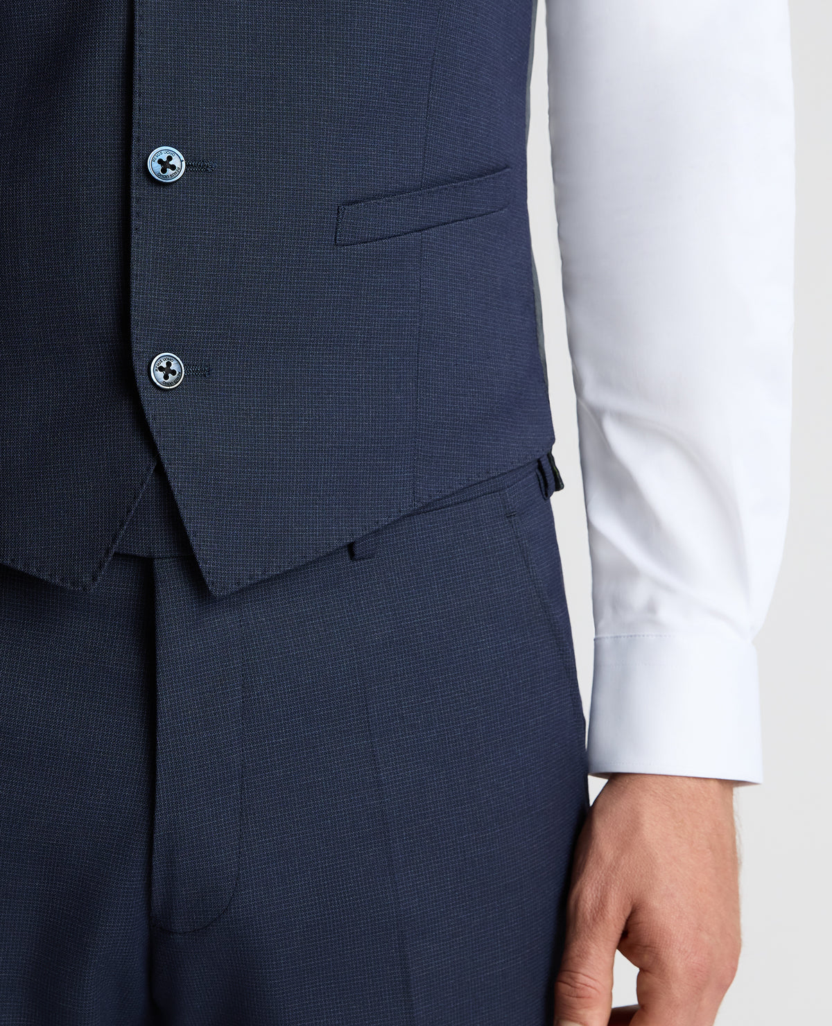Man wearing a navy suit
