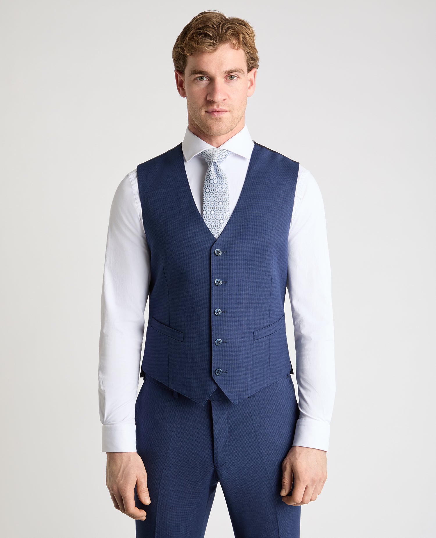 Man wearing a blue suit