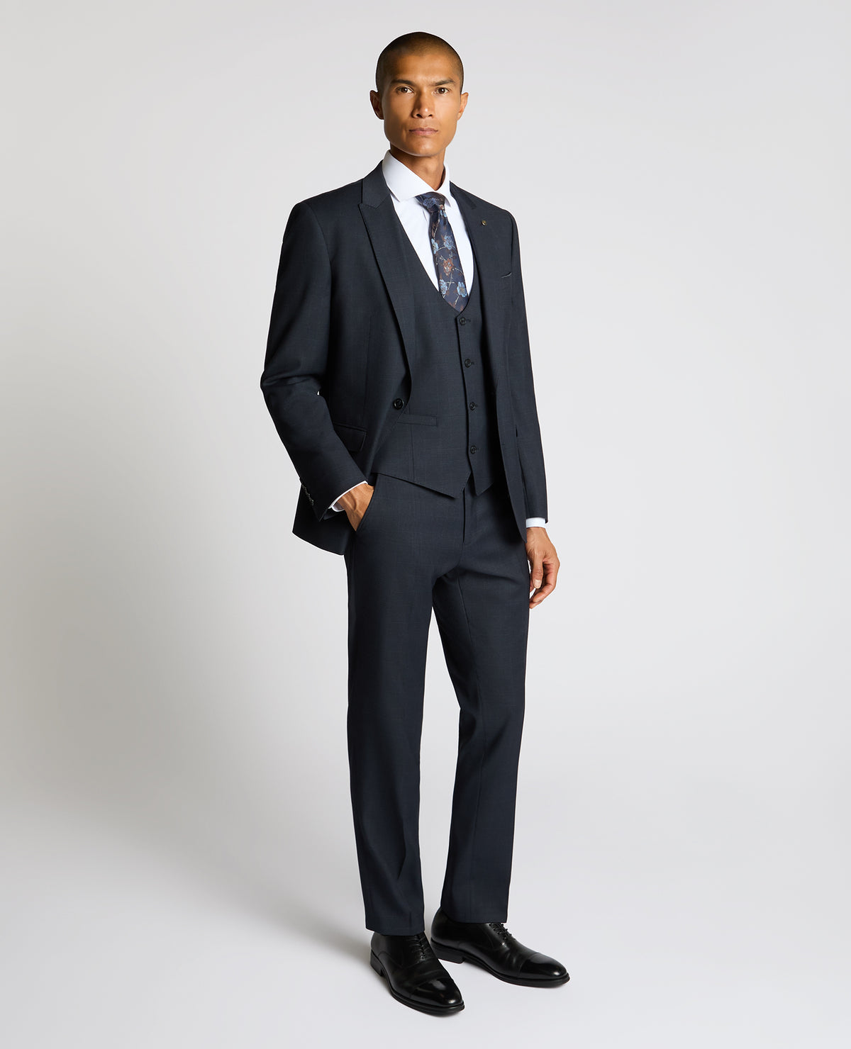 Man wearing a navy Slim Fit Stretch Waistcoat