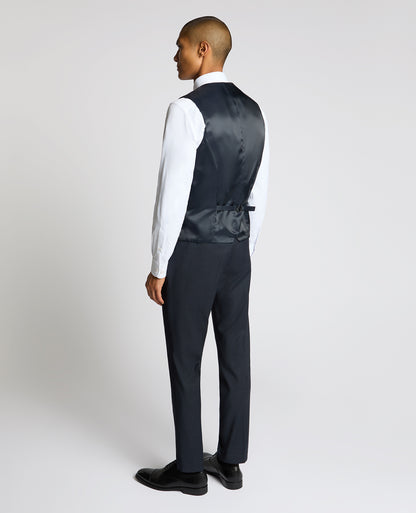 Man wearing a navy Slim Fit Stretch Waistcoat