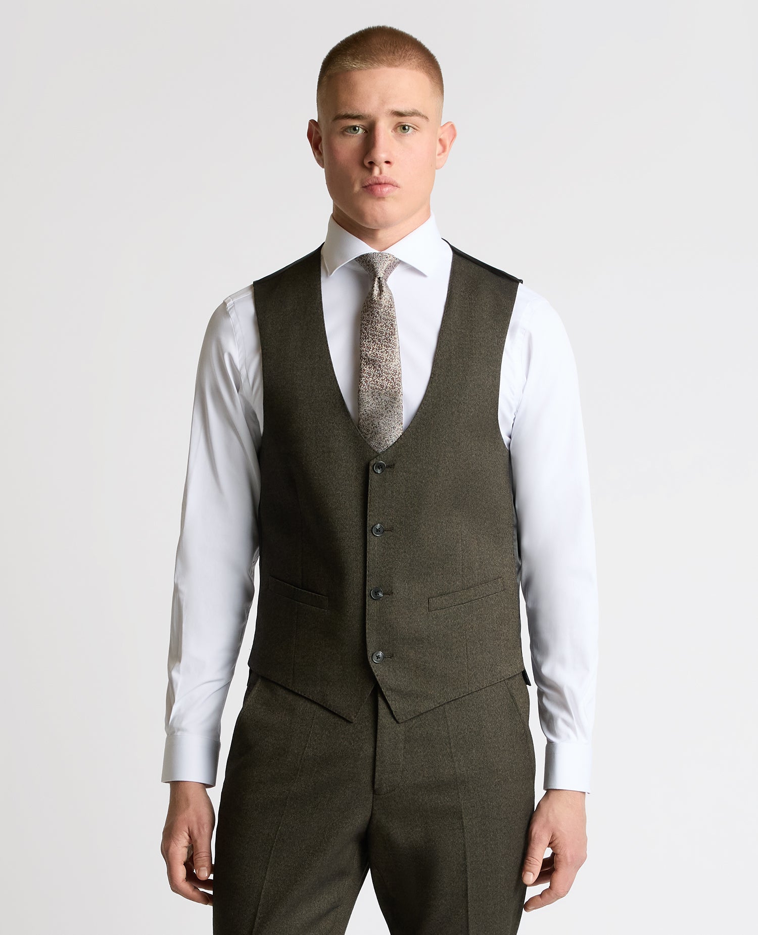 Man wearing a brown Slim fit polyviscose stretch mix and match suit waistcoat