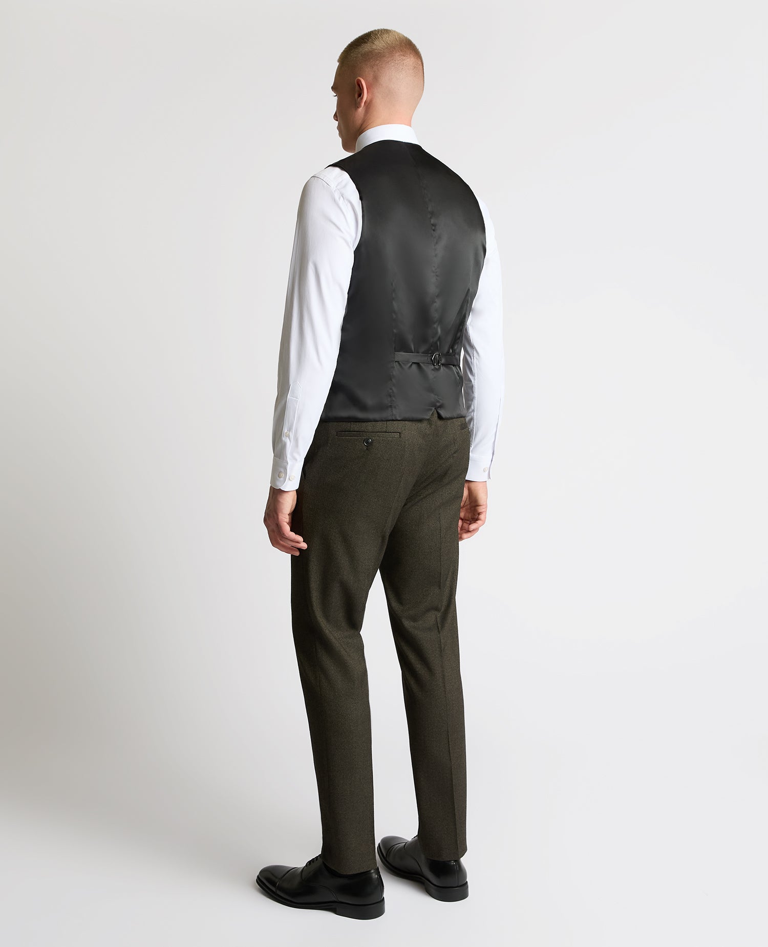 Man wearing a brown Slim fit polyviscose stretch mix and match suit waistcoat