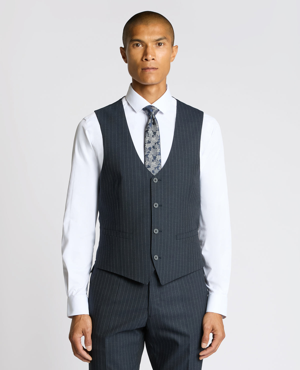 Man wearing a navy Slim Fit Stripe Waistcoat