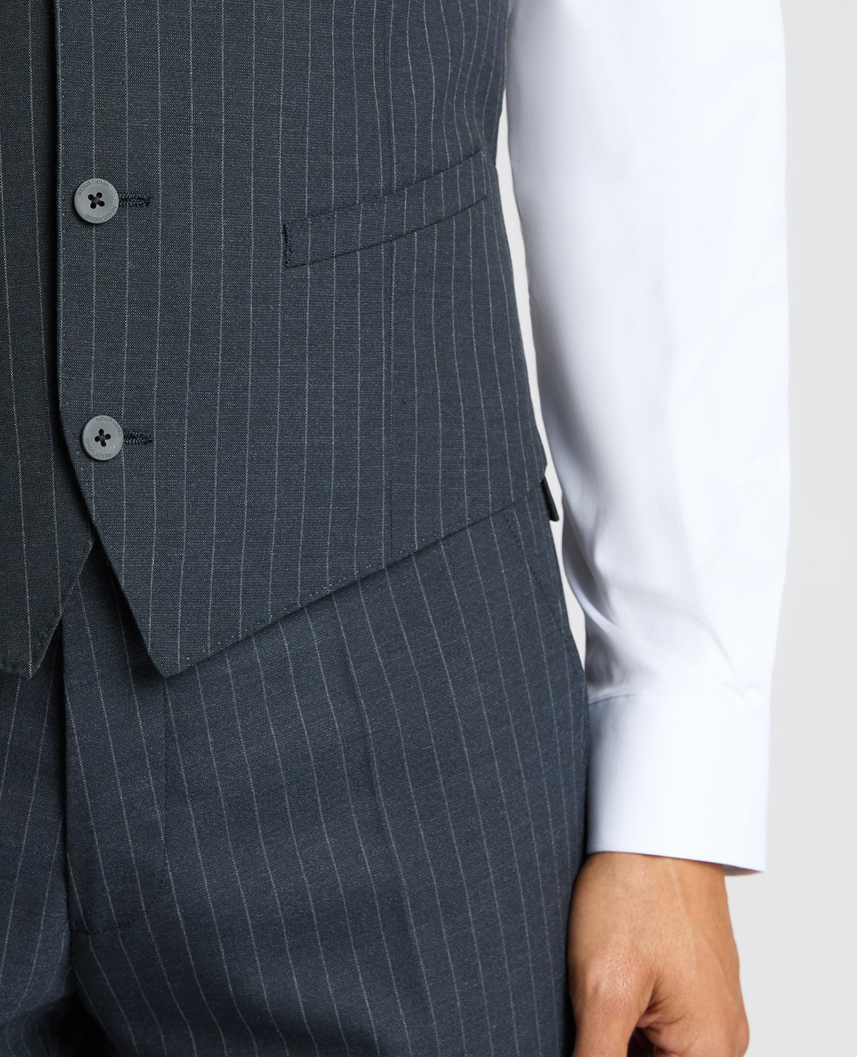 Man wearing a navy Slim Fit Stripe Waistcoat