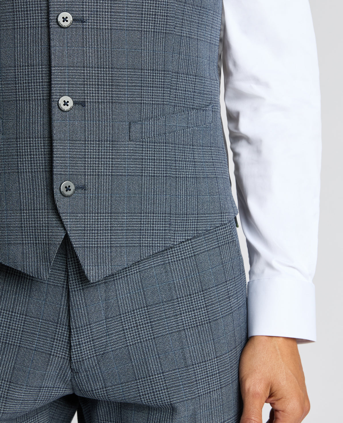 Man wearing a blue Slim Fit Check Waistcoat