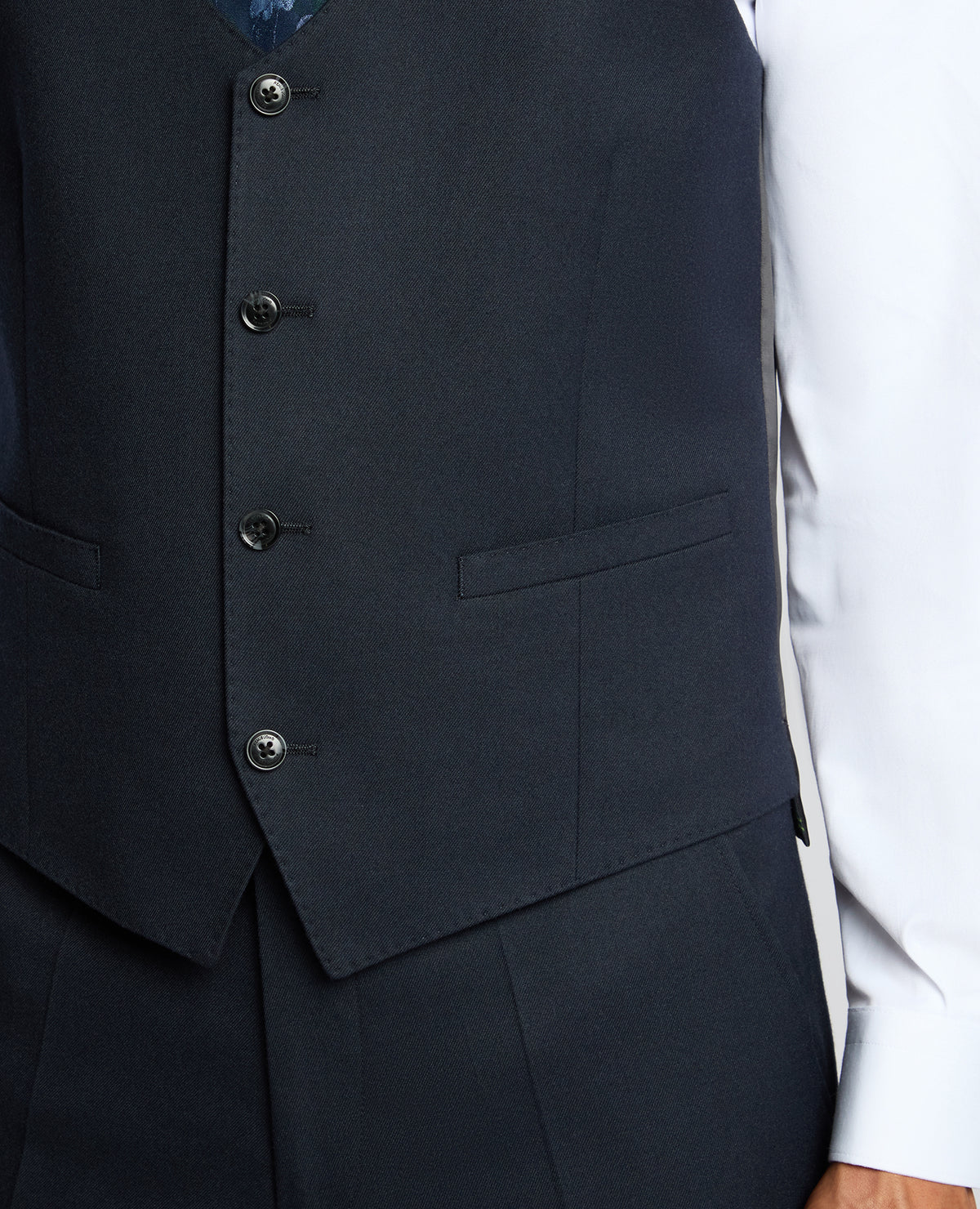 Man wearing a navy Slim Fit Stretch Waistcoat