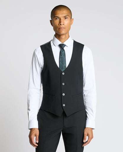 Man wearing a black Tapered Fit Black Waistcoat