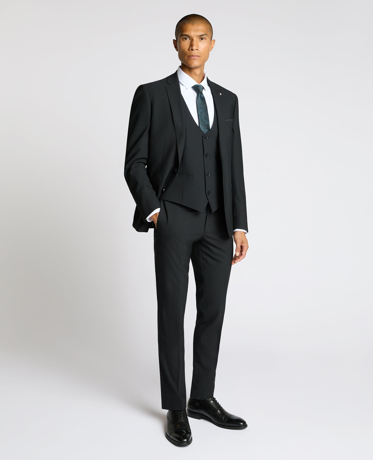 Man wearing a black Tapered Fit Black Waistcoat