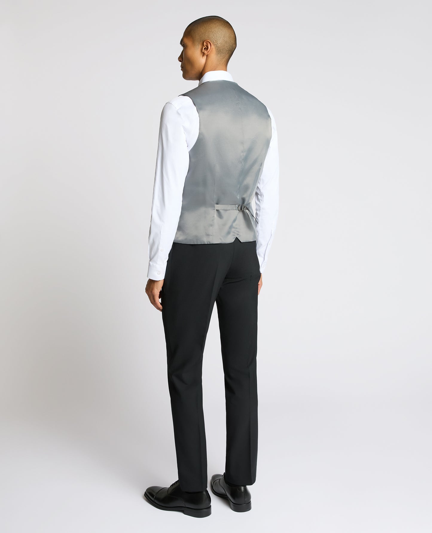 Man wearing a black Tapered Fit Black Waistcoat