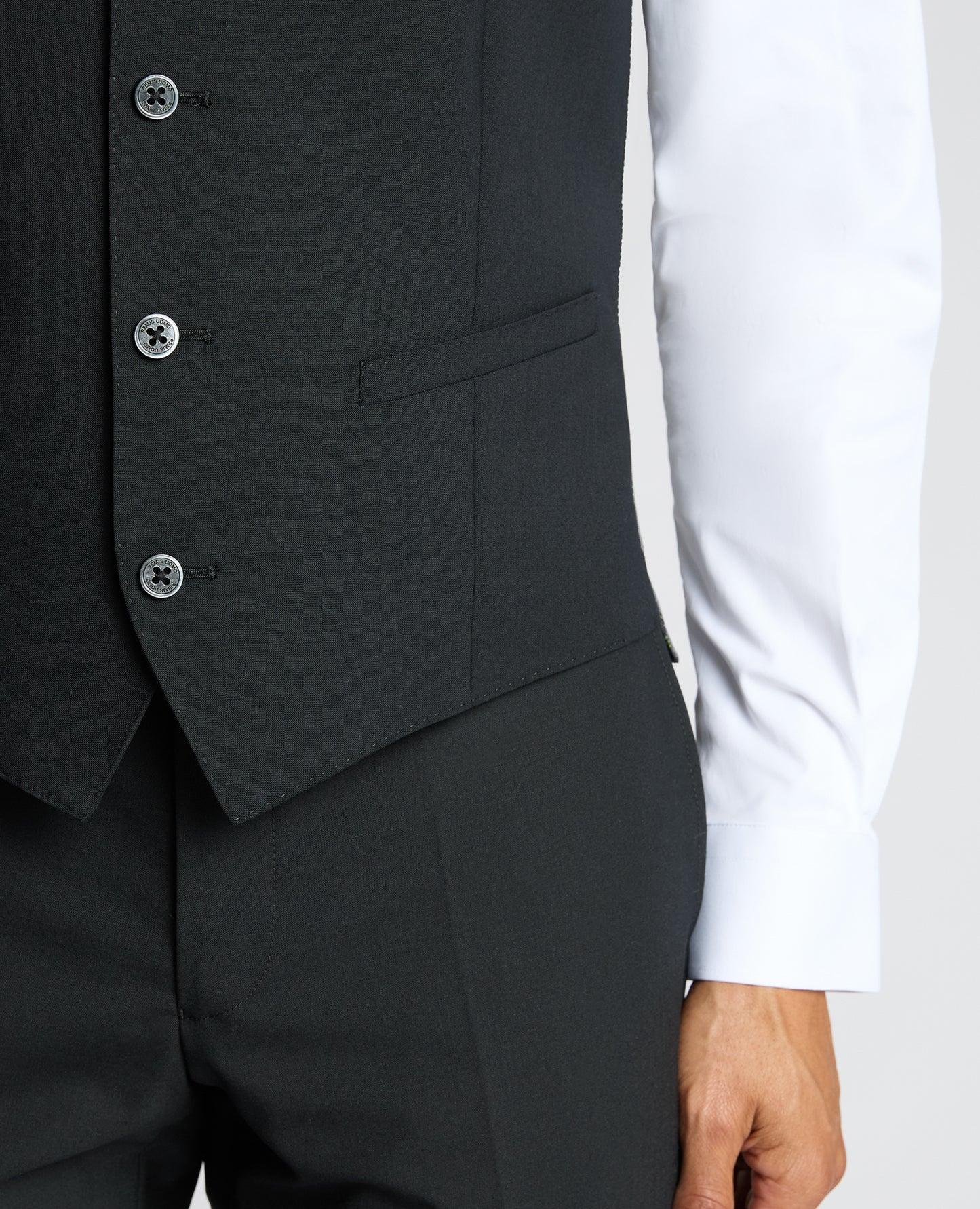 Man wearing a black Tapered Fit Black Waistcoat