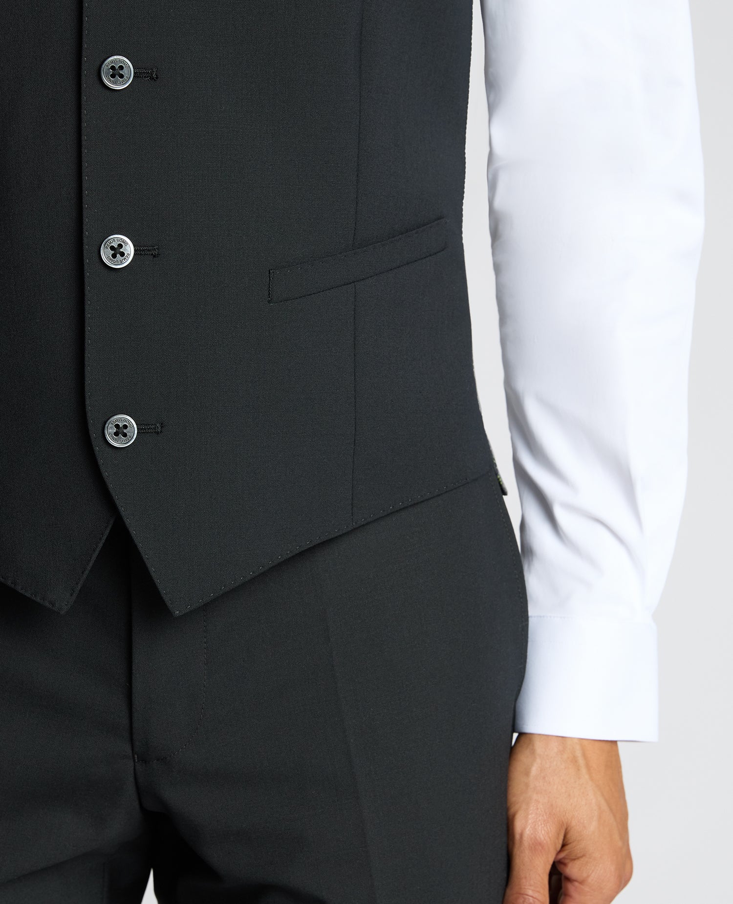 Man wearing a black Tapered Fit Black Waistcoat