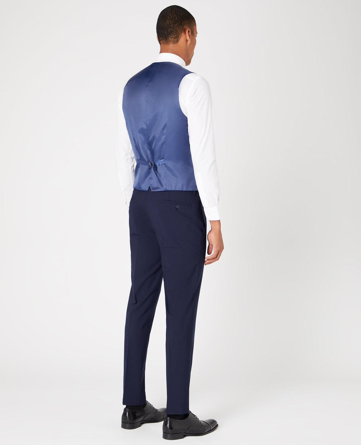 Man wearing a navy Slim Fit Wool-Rich Mix and Match Waistcoat