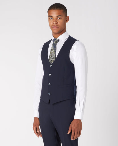 Man wearing a navy Slim Fit Wool-Rich Mix and Match Waistcoat