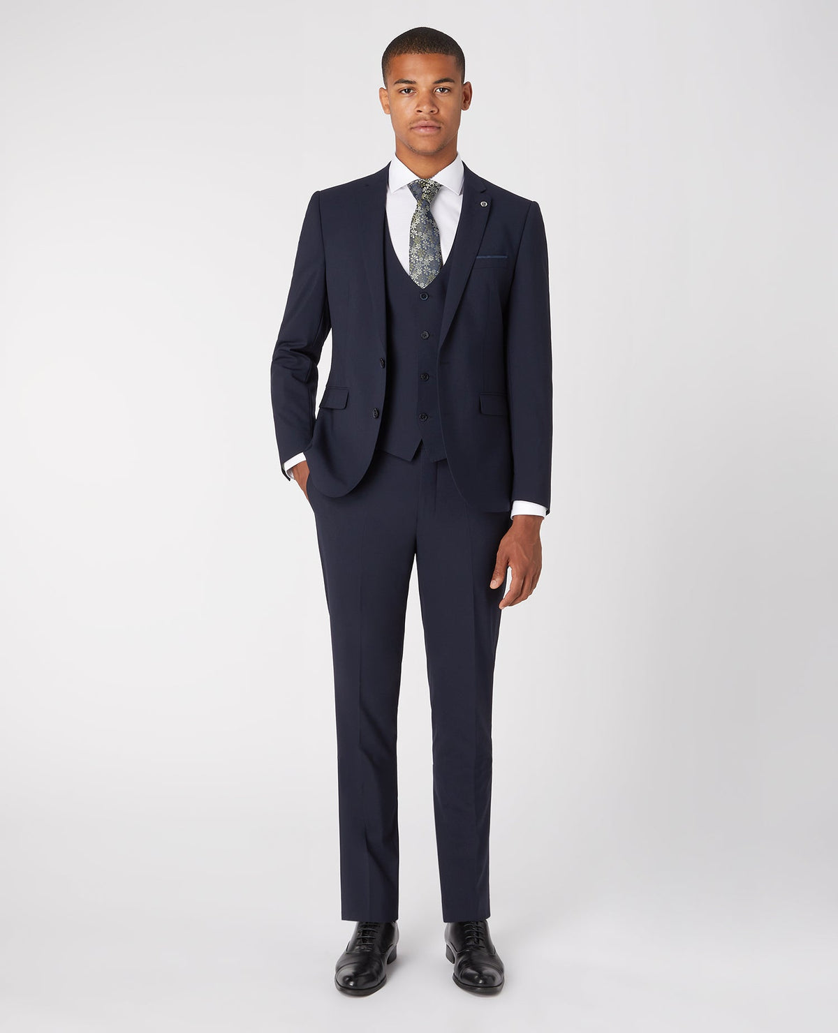 Man wearing a navy Slim Fit Wool-Rich Mix and Match Waistcoat