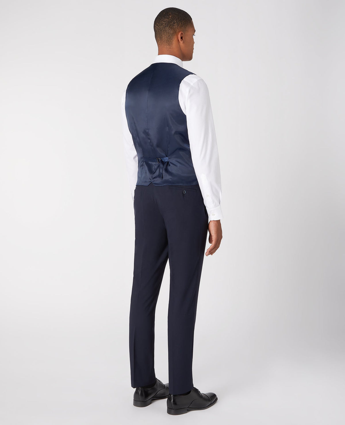 Man wearing a navy Slim Fit Wool-Rich Mix and Match Waistcoat