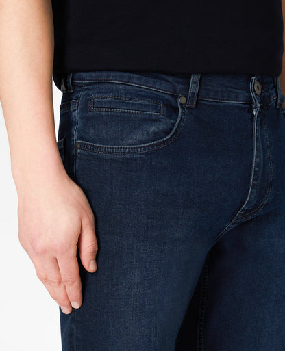 Man wearing a blue Ramsey Straight Leg Cotton-Stretch Jeans
