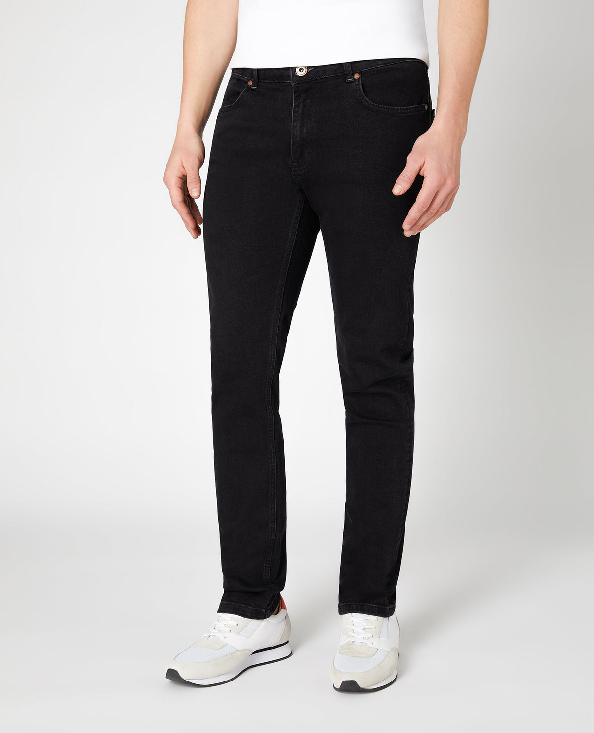 Man wearing a black Slim Fit Cotton Stretch Jeans