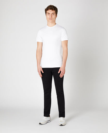 Man wearing a black Slim Fit Cotton Stretch Jeans