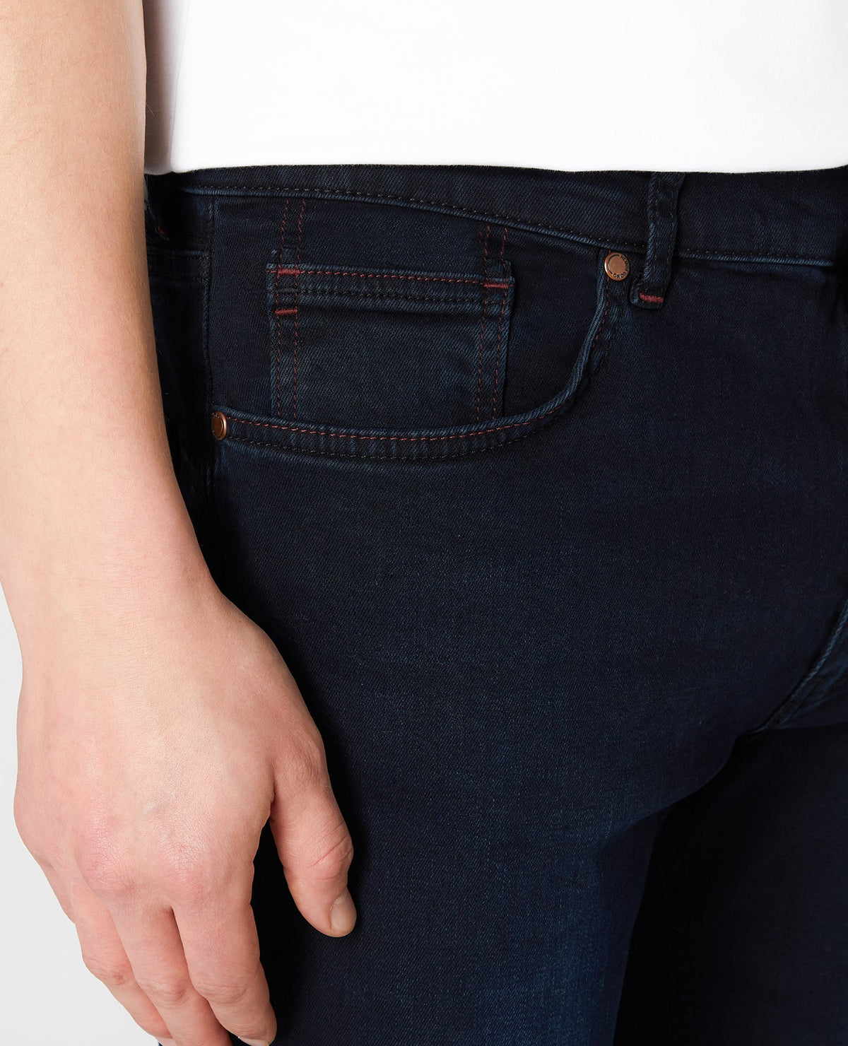 Man wearing a blue Rolston Straight Leg Cotton Stretch Jeans