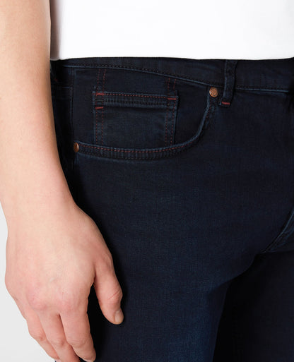 Man wearing a blue Rolston Straight Leg Cotton Stretch Jeans