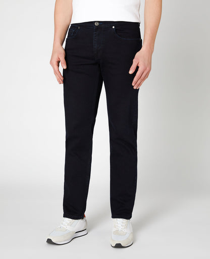 Man wearing a navy Rolston Straight Leg Cotton Stretch Jeans