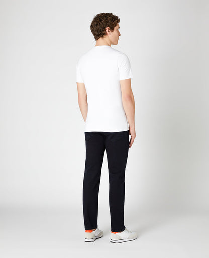 Man wearing a navy Rolston Straight Leg Cotton Stretch Jeans