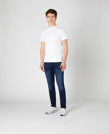 Man wearing a blue X-Slim Fit Cotton-Stretch Jean