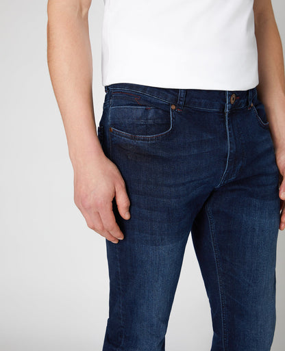 Man wearing a blue X-Slim Fit Cotton-Stretch Jean