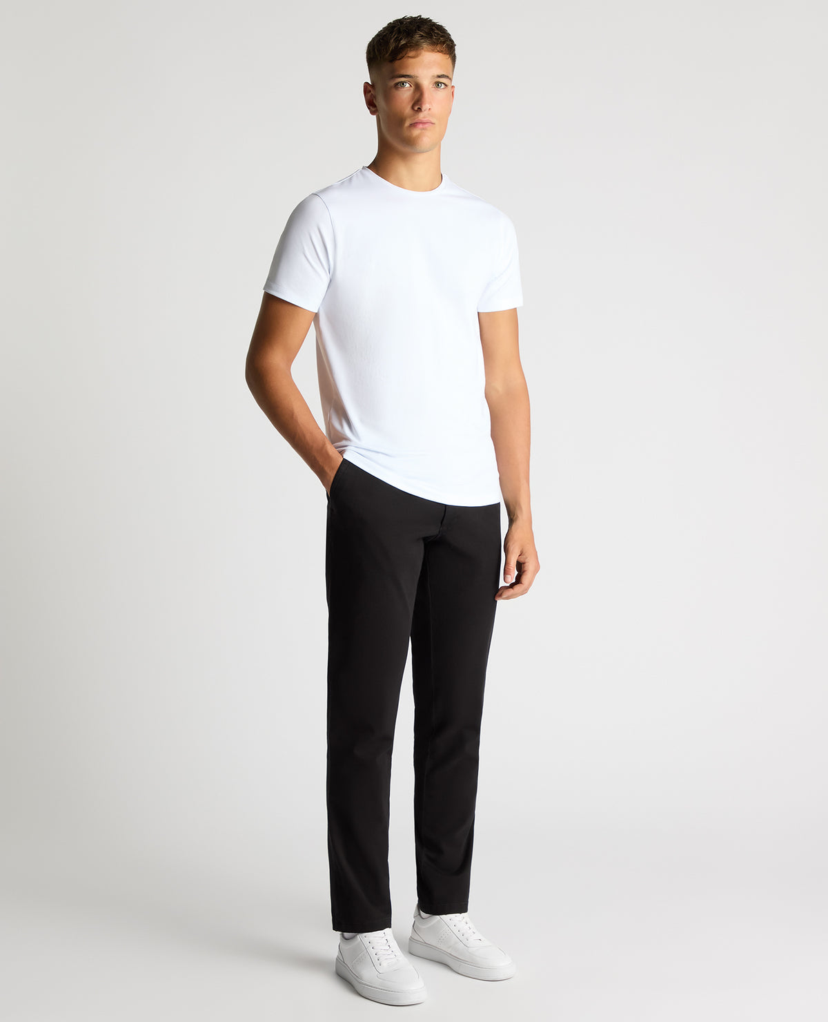 Man wearing a black Slim Leg Cotton-Stretch Chino