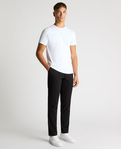 Man wearing a black Slim Leg Cotton-Stretch Chino