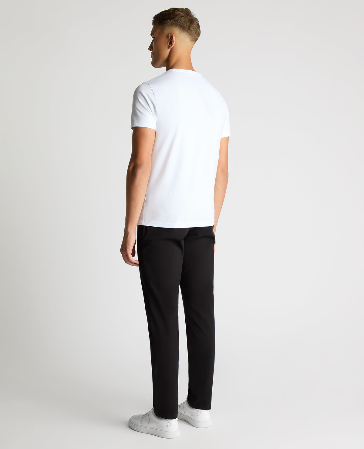 Man wearing a black Slim Leg Cotton-Stretch Chino