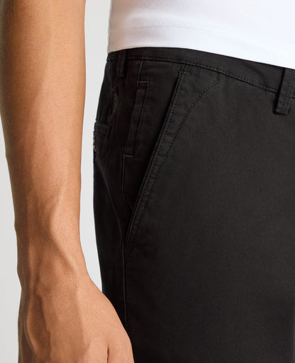 Man wearing a black Slim Leg Cotton-Stretch Chino
