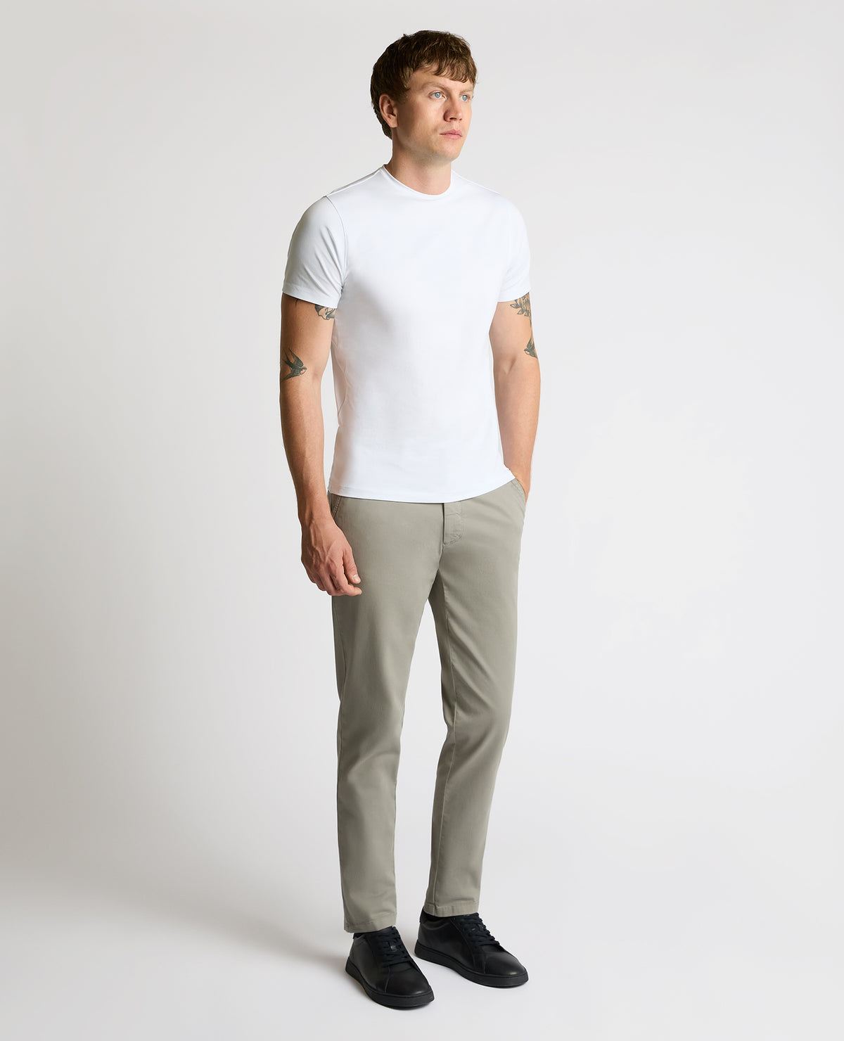 Man wearing a grey Slim Leg Cotton-Stretch Eldon Chino