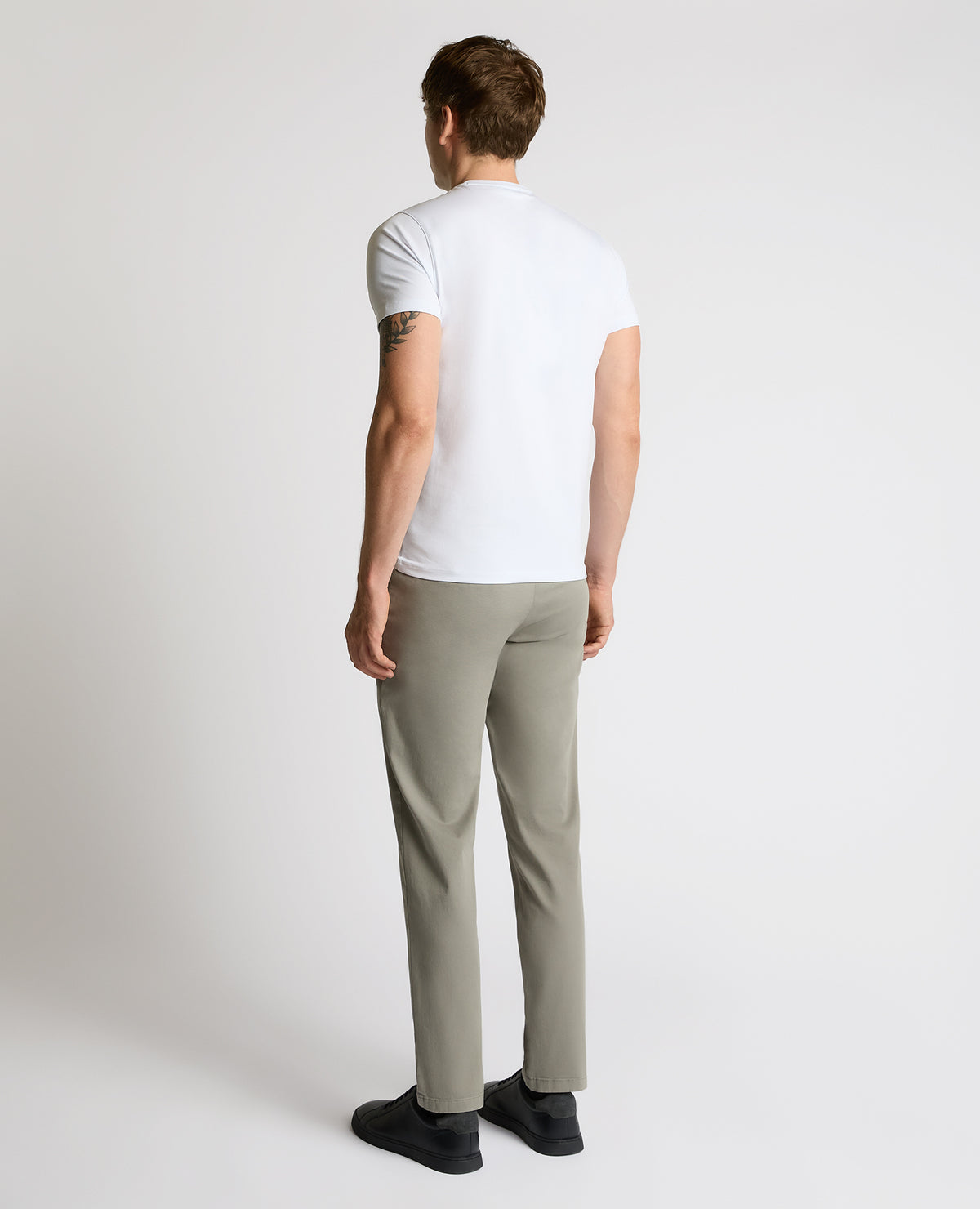 Man wearing a grey Slim Leg Cotton-Stretch Eldon Chino