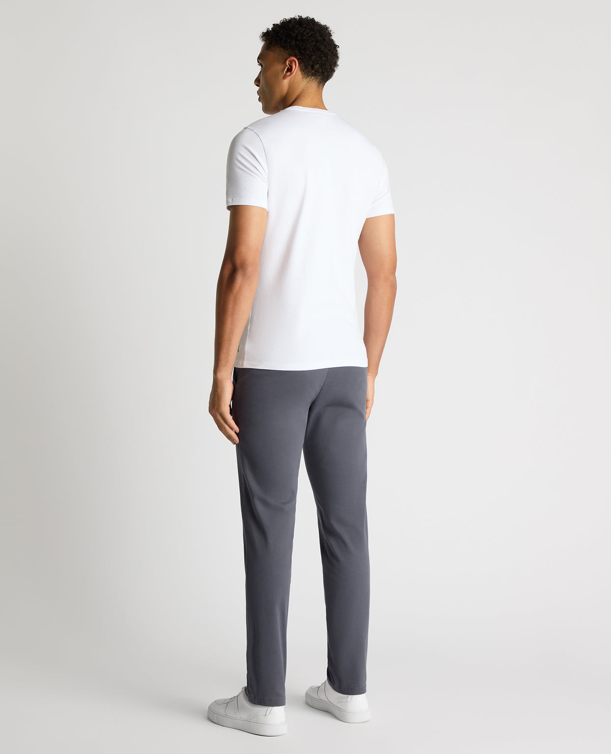 Man wearing a blue Slim Leg Cotton-Stretch Chino