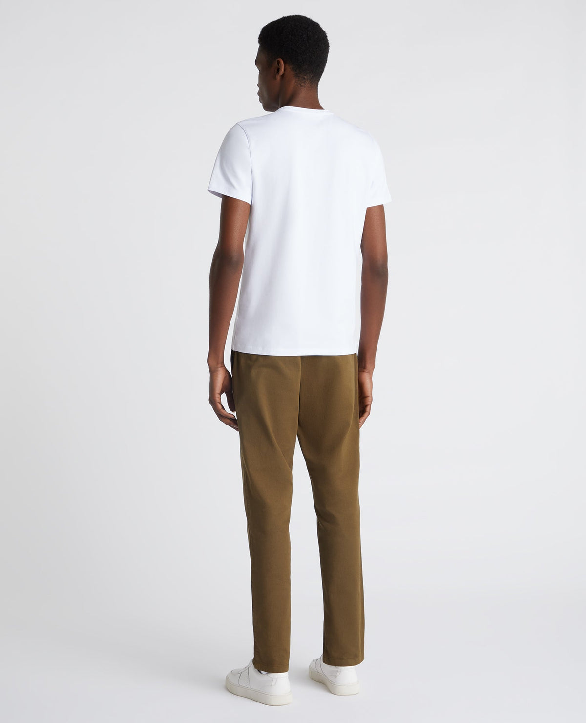 Man wearing a green Slim Leg Cotton-Stretch Chino