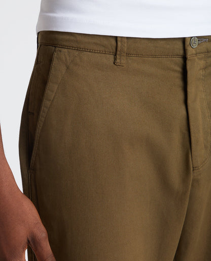 Man wearing a green Slim Leg Cotton-Stretch Chino