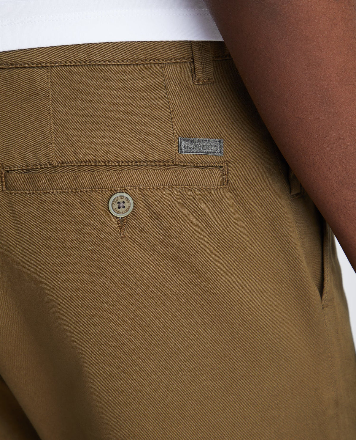 Man wearing a green Slim Leg Cotton-Stretch Chino