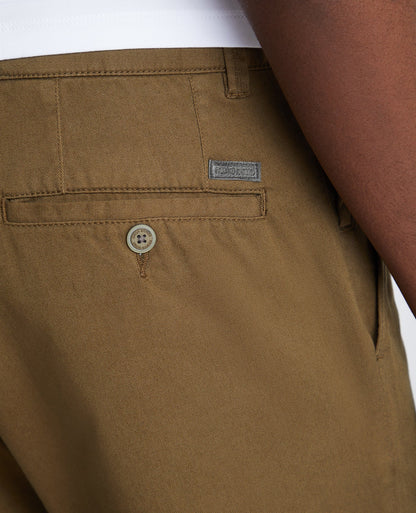 Man wearing a green Slim Leg Cotton-Stretch Chino